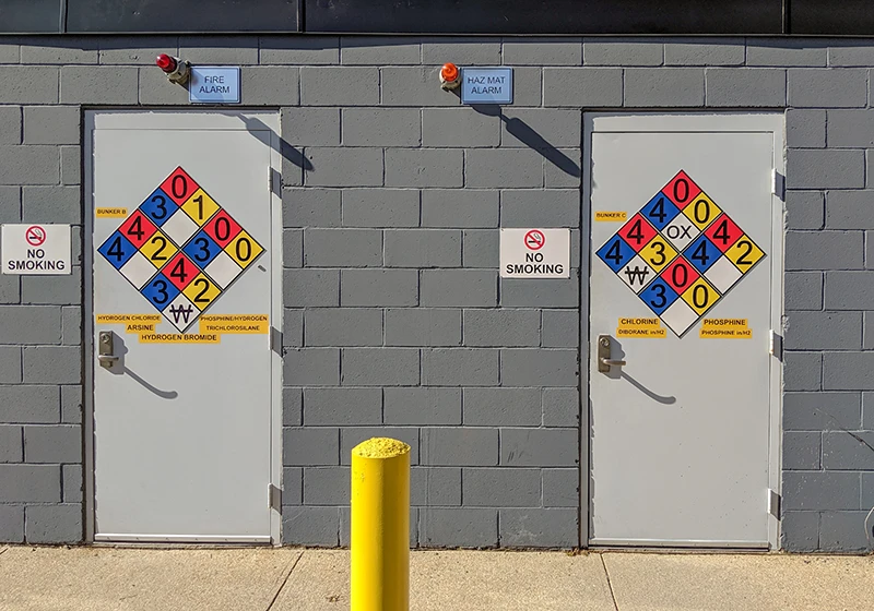 A hazardous materials facility with warning labels